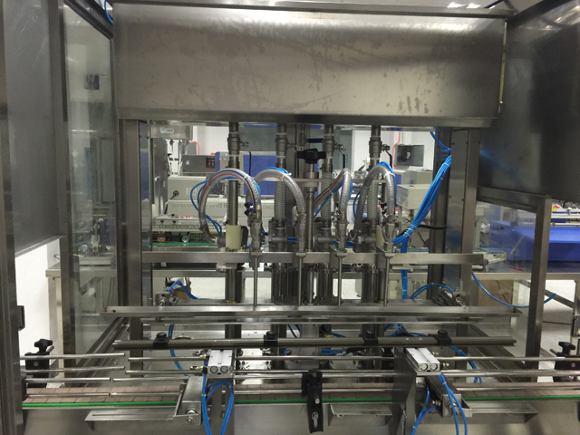 ચાર હેડ ફિલિંગ machinery.jpg