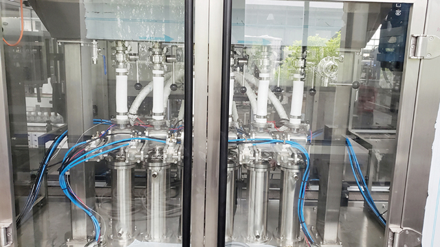 6 હેડ મોટા કન્ટેનર 5 લિક્વિડ ફિલિંગ કેપિંગ ડબલ સાઇડેડ