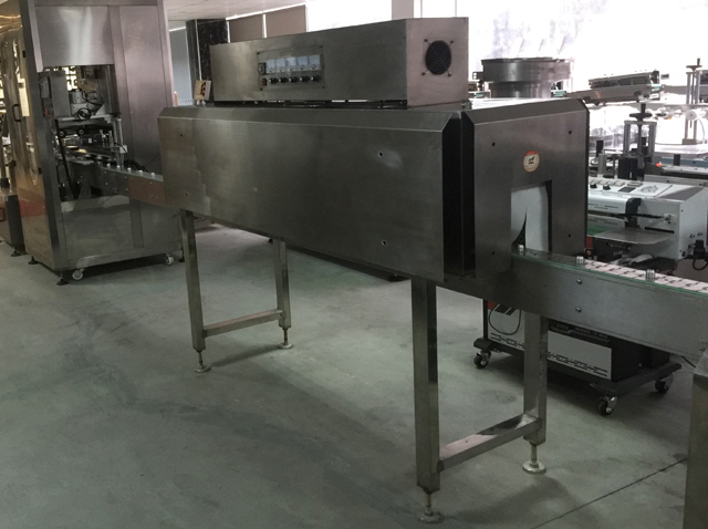 કેપ્સ સીલિંગ લાઇન shrinking.jpg