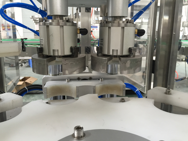 વેક્યુમ કેપીંગ મશીન.jpg