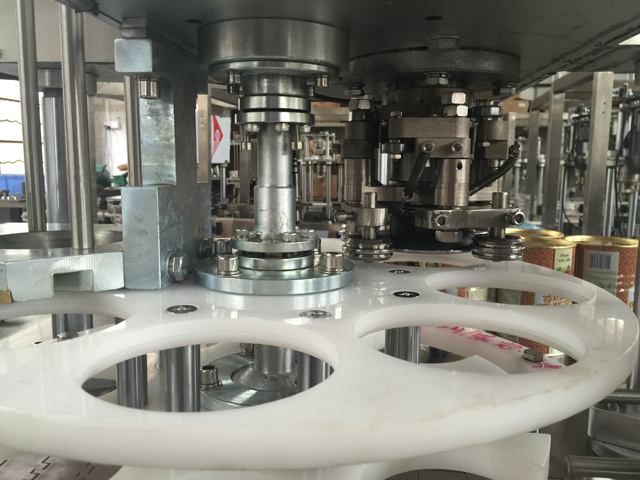 can sealing.jpg દરમિયાન કેનની સ્થિતિ