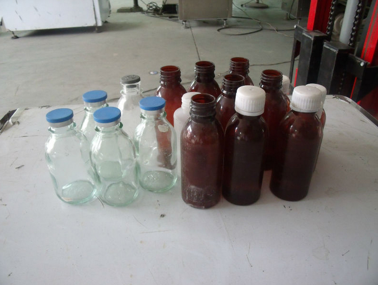 medical bottles samples કેપીંગ મશીન.jpg ભરવા માટેની બોટલો