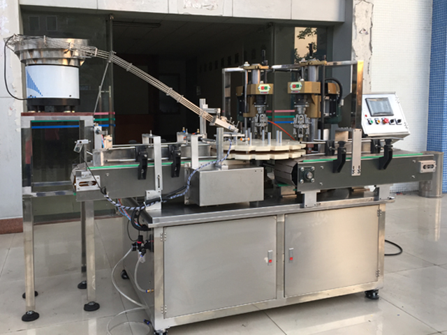 capping machine with 2 capping heads સ્ક્રુ કેપર ઇક્વિપમેન્ટ સેમી ઓટોમેટિક.જેપીજી