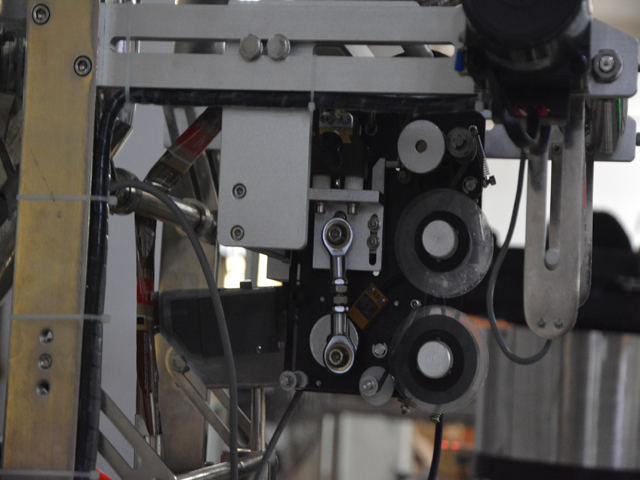 bags.jpg માં લિક્વિડ ફિલર માટે તારીખ કોડિંગ ભાગ