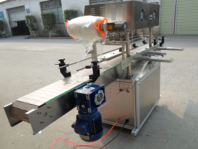 automatic jars sealing equipment in factory jars sealing machine.jpg