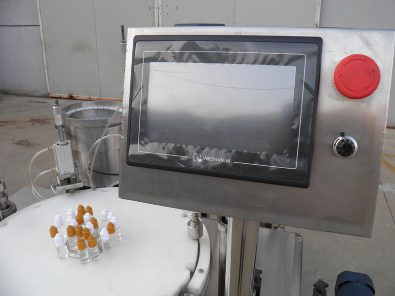 filling plugging capping labeling production line E લિક્વિડ PLC બોટલ ફિલર કેપિંગ લેબલિંગ.jpg