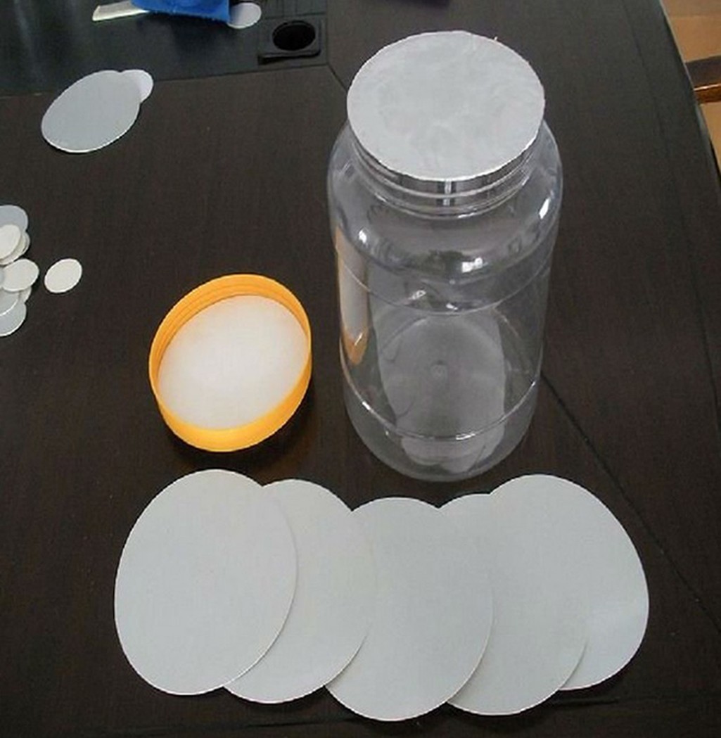 sealing effect for aluminum sealer અર્ધ સ્વચાલિત પ્રવાહી ઉત્પાદન line.jpg