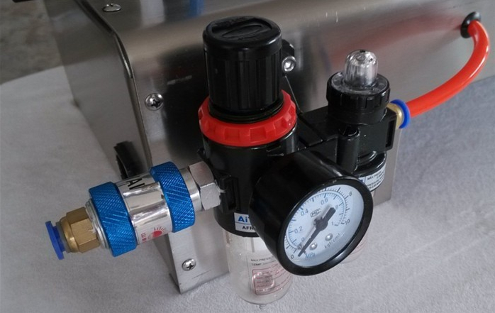 pneumatic liquid lotion filling machine મશીન.jpg ભરવા માટે હવાવાળો ભાગ