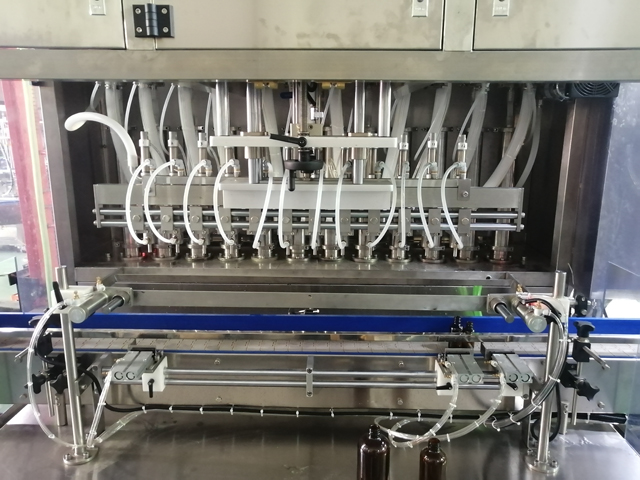 મિક્સિંગ હીટર સાથે 12 હેડ ફિલિંગ મશીન (4).jpg