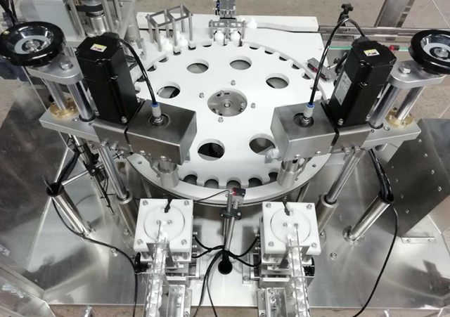 બોટલ્સ રોબોટ આર્મ feeder.jpg