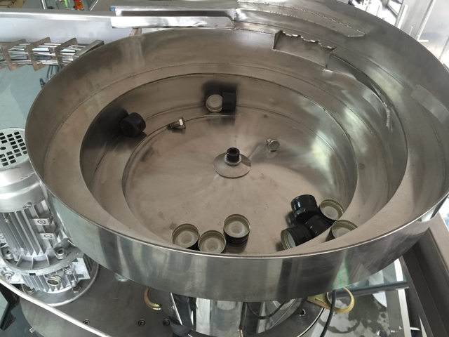 કેપ્સ વાઇબ્રેટર ફીડિંગ સિસ્ટમ.jpg