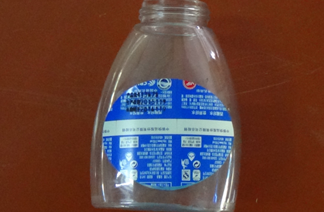 ફ્લેટ બોટલ માટે રોલિંગ લેબલીંગ મશીન samples.jpg