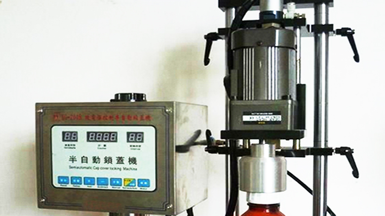 press capping equipments semi automatic પ્રેસ કેપર સાધનો.jpg