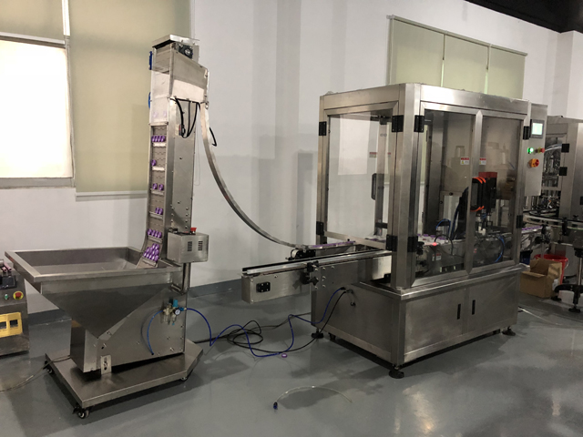 કેપિંગ મશીન કોસ્મેટિક મશીનો.જેપીજી